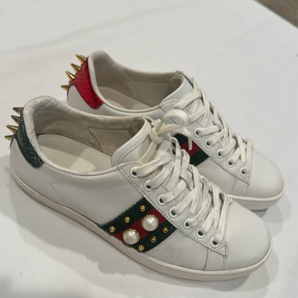 Authentic Gucci sneakers with pearl and spikes design